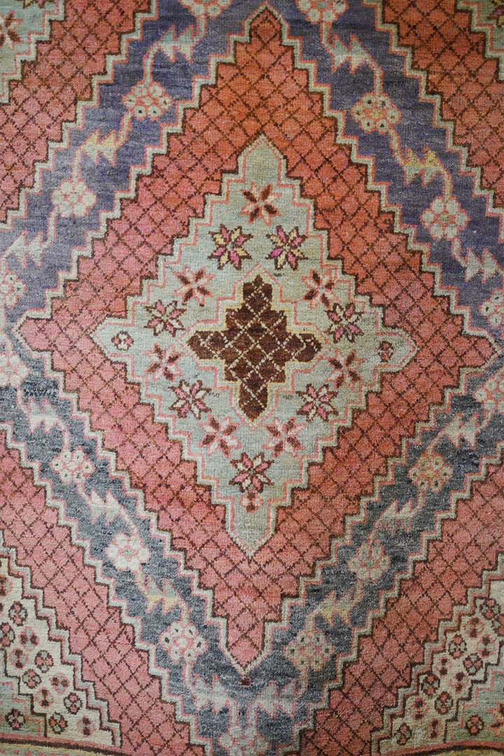 East Turkestan Rug | Stepped Diamond Medallion Cinnabar | Detail View