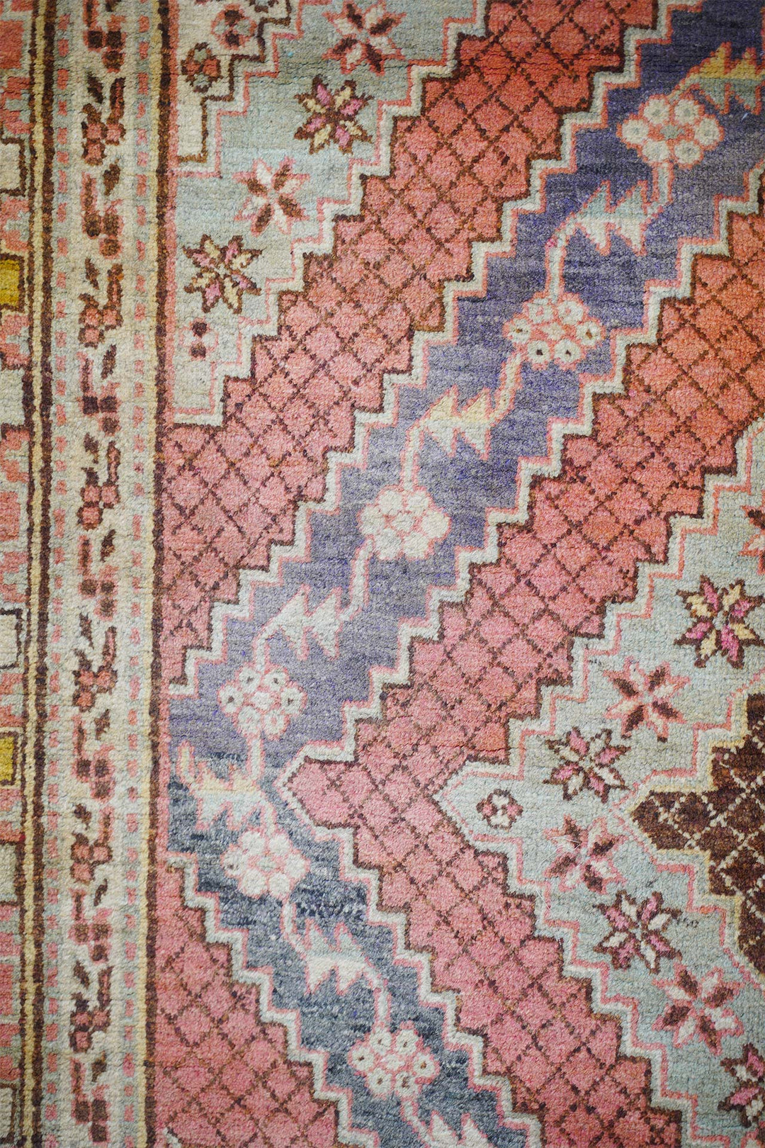 East Turkestan Rug | Stepped Diamond Medallion Cinnabar | Detail View