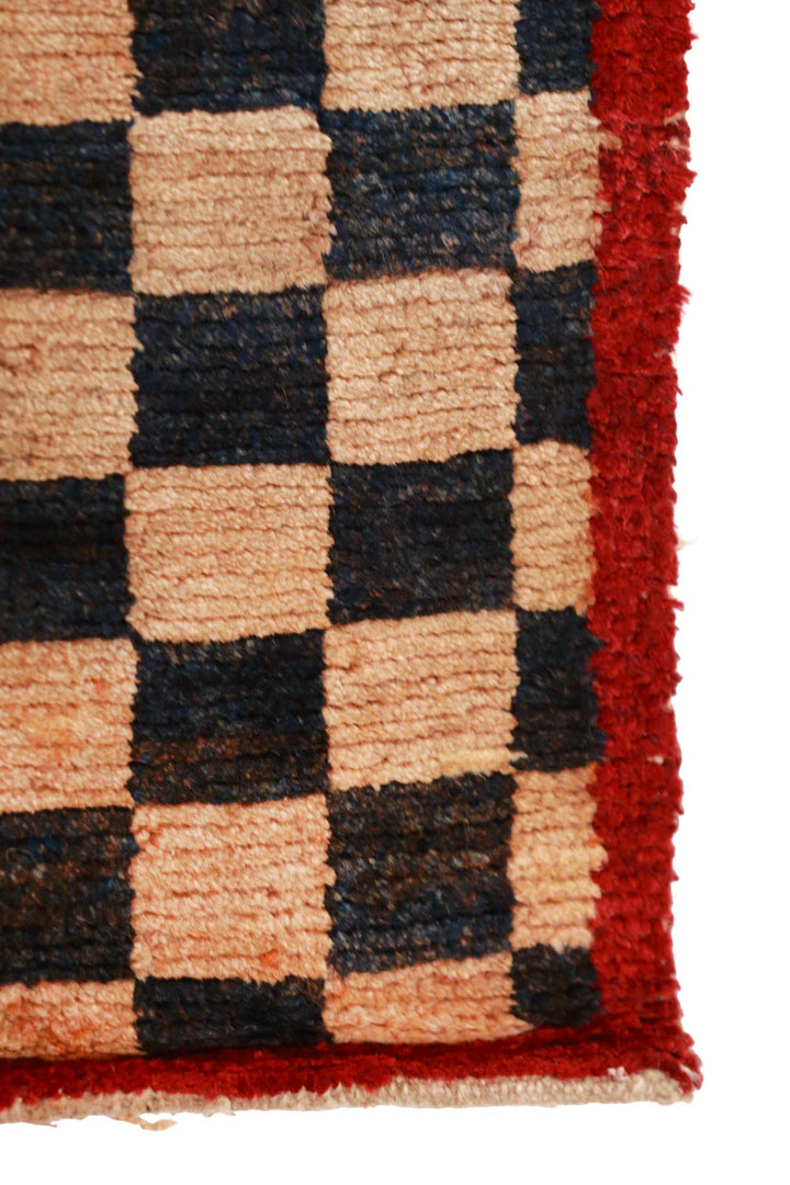 Hand-Knotted Tibetan Khaden Rug | Classic Black &amp; Peach Checkerboard with Crimson Guard Border | Detail View