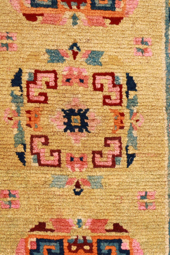 Hand-Knotted Tibetan Khaden Rug | Coral Field with Geometric Medallions | Detail View