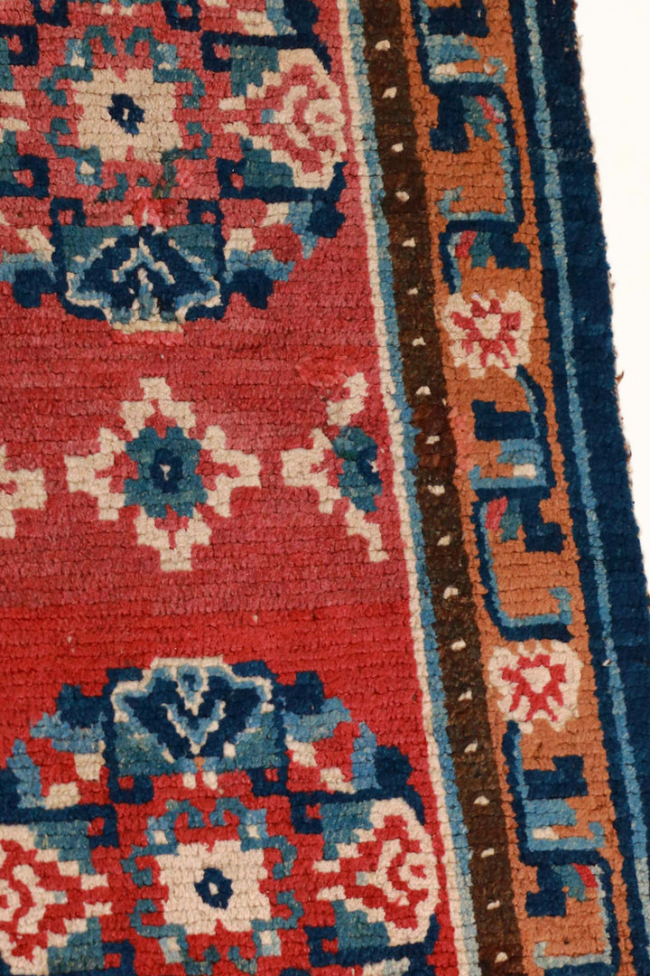 Hand-Knotted Tibetan Runner | Crimson Field Geometric Medallion Border | Detail View