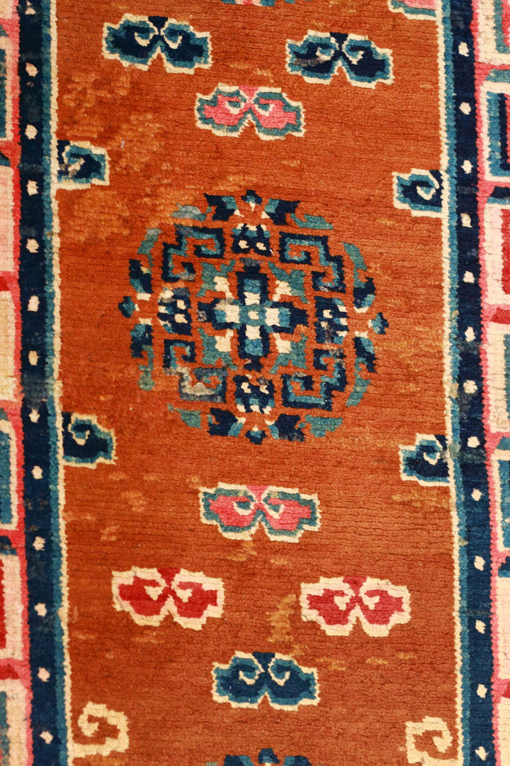 Hand-Knotted Tibetan Runner | Rust Field Medallion &amp; Key Border Pattern | Detail View