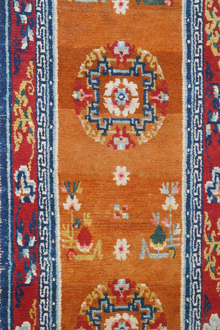 Hand-Knotted Tibetan Runner | Saffron Apricot Coin Roundel | Detail View